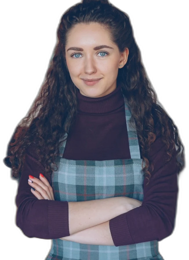 Dona de negócio sorrindo de braços cruzados, confiante